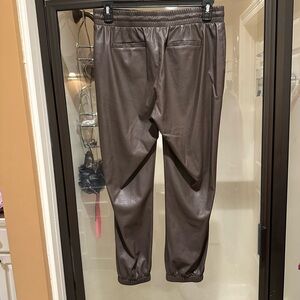 Brown pleather pants. Very cute and stylish.